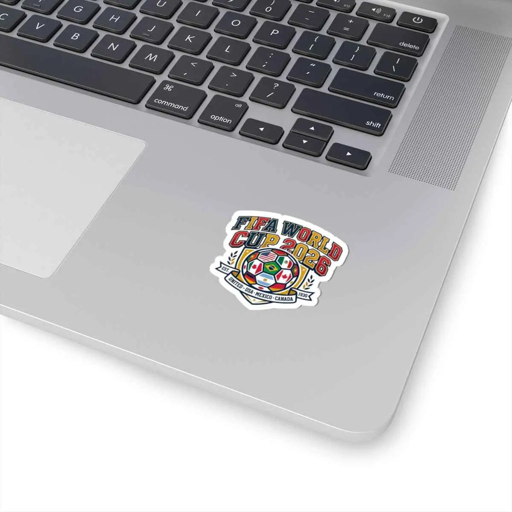 World Cup 2026 soccer sticker on a laptop, showcasing vibrant colors and a soccer motif for fans.
