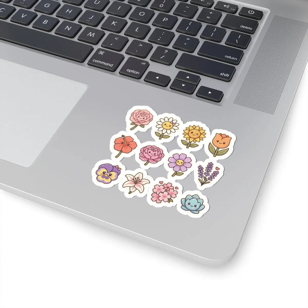 Cute floral kiss-cut stickers on a laptop, featuring vibrant hand-drawn flowers in pastel colors.