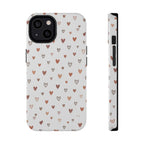 Heart Doodle Impact-Resistant Phone Case featuring cute neutral tiny hearts design in warm tones.