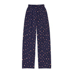 navy heart print kids lounge pants featuring a scattered heart motif on a cozy fabric surface.
