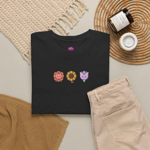 Floral back to school tee featuring colorful flower designs on a black t-shirt, perfect for teachers and students.
