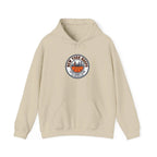 City Basketball Varsity Logo Hoodie featuring New York skyline emblem on a beige sweatshirt.