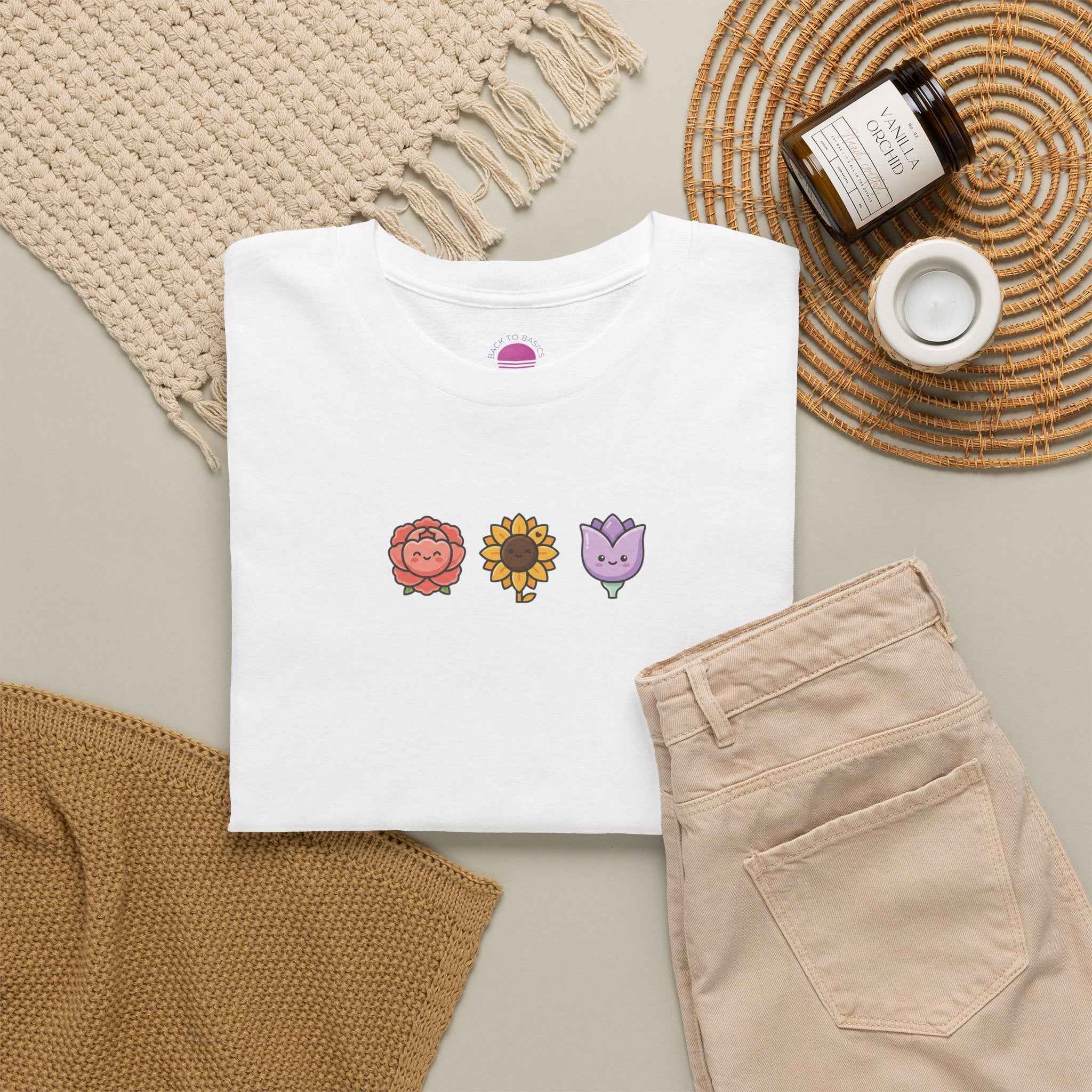 floral back to school tee featuring cute flower graphics on a white t-shirt styled with neutral pants and accessories
